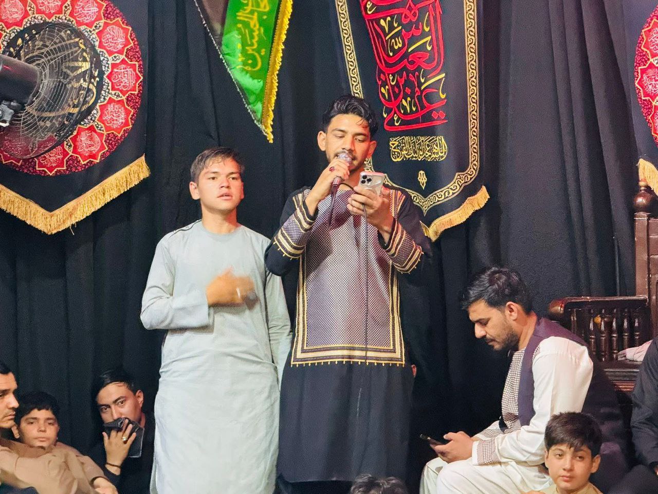مراسم تعویض پرچم اباعبدالله الحسین علیه السلام در تکیه خانه باب الحوائج قندهار1